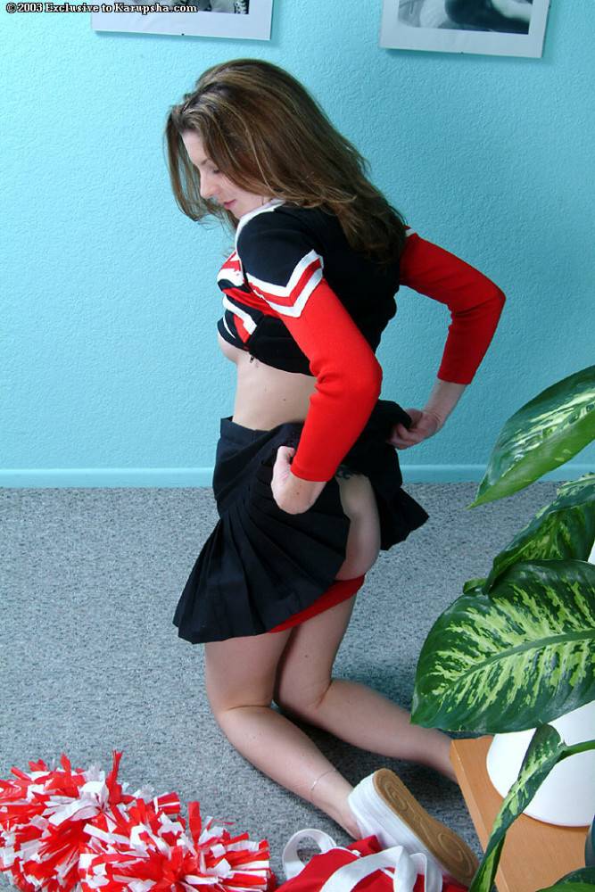 Smiling Uniformed Cheerleader Lisa Marie Takes Off Her Red Panties And Shows Her Pink Pussy - #8