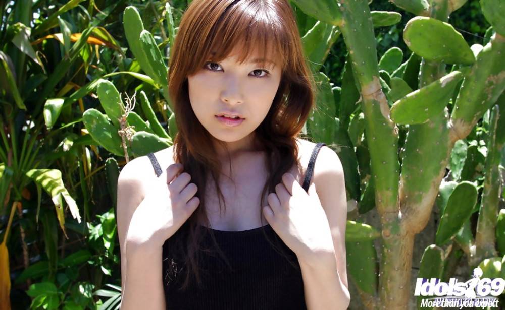Enticing japanese babe Yua Aida denudes big boobs and butt outdoor - #17