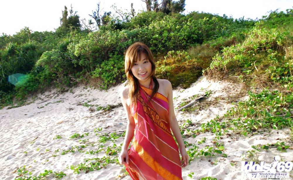 Enticing japanese babe Yua Aida loves some hot foot fetish at beach - #14