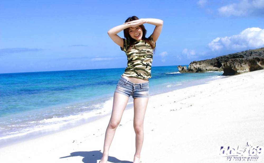Alluring japanese babe Yua Aida exhibits big titties and ass at beach - #1