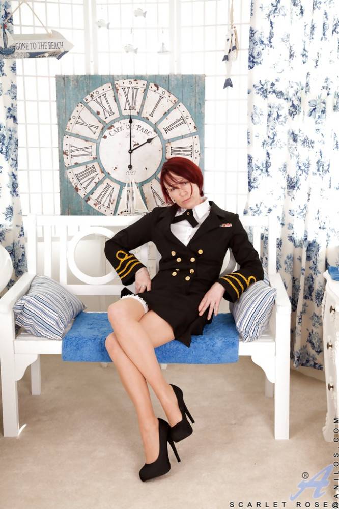 Curious british redheaded mature Scarlet Rose in uniform outfit exposes her butt and hairy beaver - #3