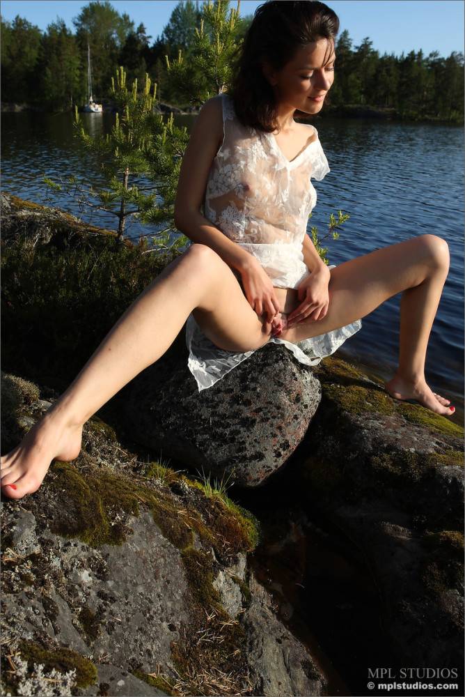 Lara Short Is Sitting On Rocky Coast In Transparent White Dress And Spreading Legs And Hotly Posing Nude - #4