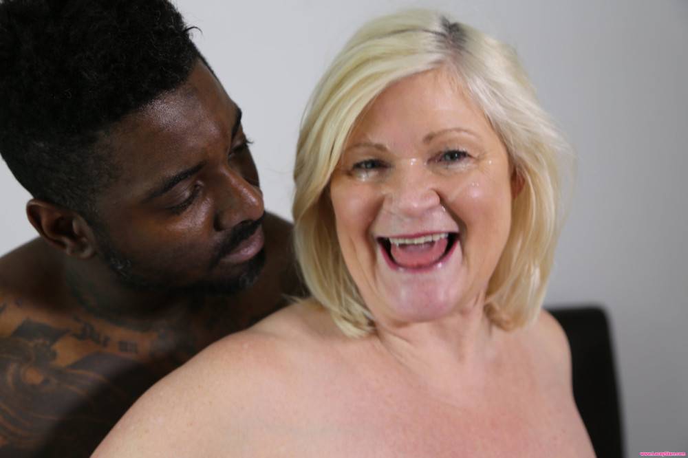 Chubby blonde granny Lacey Starr tastes a black cock before riding it - #20