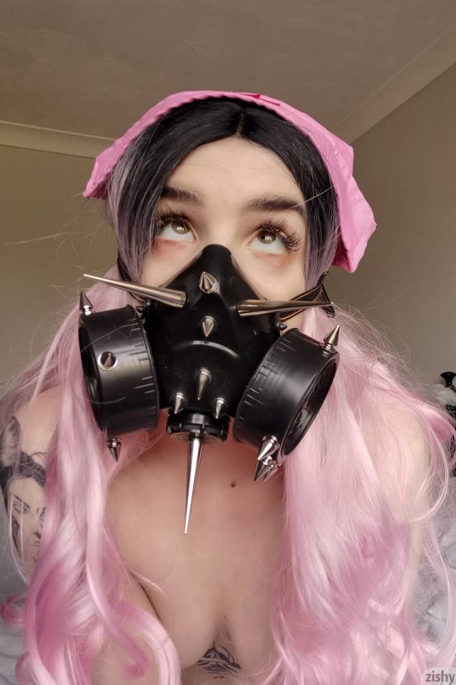 Naughty Quarantine Challenge sheds her nurse costume & poses in a gas mask - #1