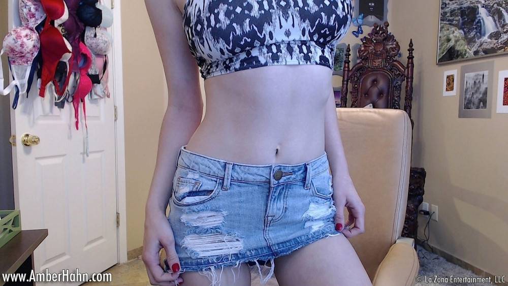 Amber hahn wears a mini denim skirt with her crop top - #3