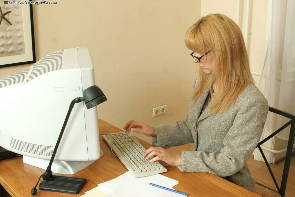 Excellent blond milf Jessica in glasses exposing big hooters and jerking off in office - #1
