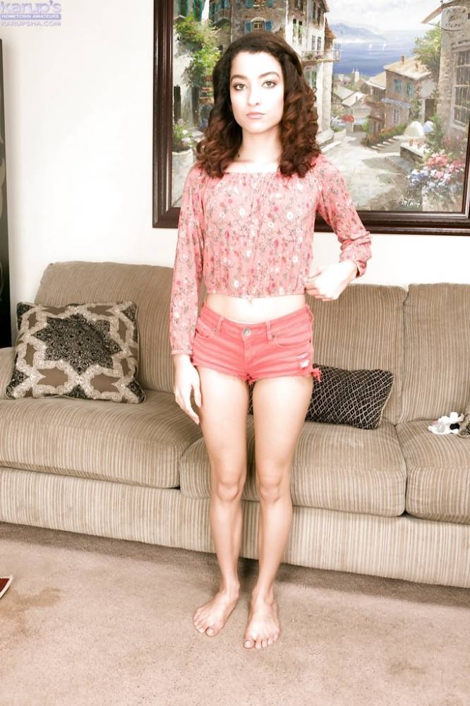 Slim american youthful Lana Lovelace in fancy shorts bares small tits and masturbates | Photo: 8576015