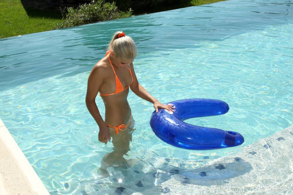 Slim hungarian blond teen Brandy Smile in hot bikini revealing small tits and masturbating near the pool | Photo: 8665862