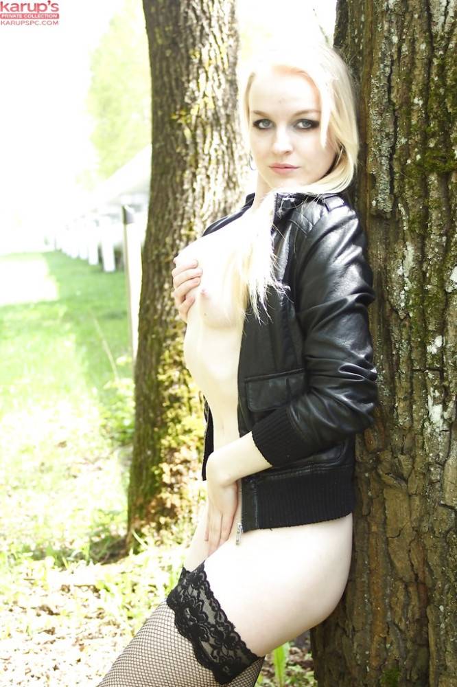 Stunning latvian blond young Bella Lei in hose exposes her ass and sissy outdoor | Photo: 8734439