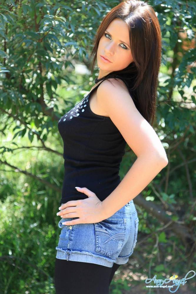 Alluring Brunette Ann Angel In Ultra Stylish Black Denim Shorts Poses In Nature - #14