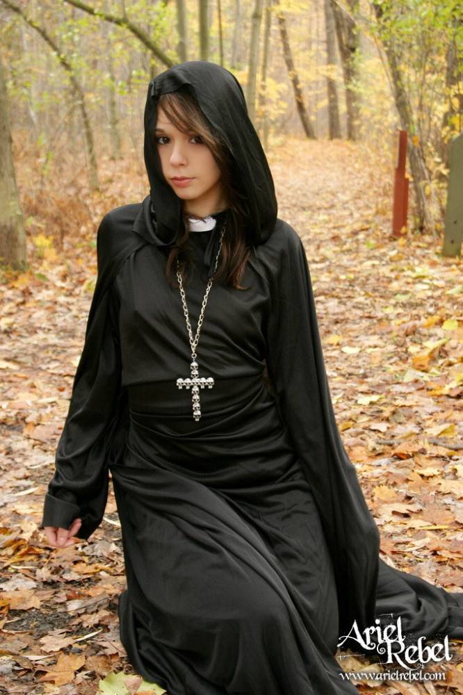 Naughty Teenage Nun Ariel Rebel Dressed In Black Flashes Her Bald Pussy Outdoors - #9