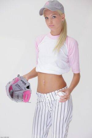 Baseball cutie Francesca loses her uniform to expose her skinny teen body on pornstar6.com