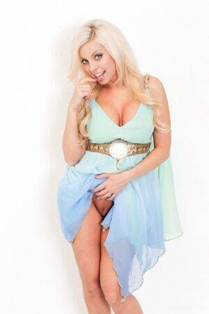 Platinum blonde chick Britney Amber flashes her up skirt pussy on pornstar6.com