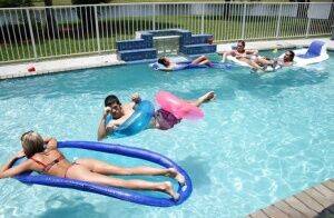 Frolic girls in bikini flashing their tits at the pool party on pornstar6.com