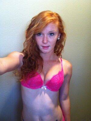 Natural redhead Alex Tanner slips off her pink lingerie set for nude selfies on pornstar6.com