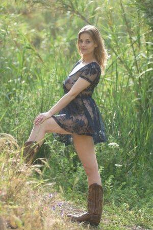 Beautiful amateur babe Lottii Rose wearing sexy dress and boots in the nature on pornstar6.com