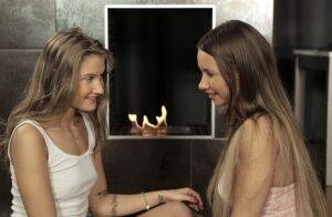 Teen lesbians Taylor Sands & Tiffany Tatum 69 on a rug in front of a fireplace on pornstar6.com