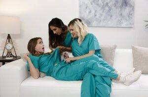 Teen lesbians remove scrubs and socks before an all girl threesome on pornstar6.com