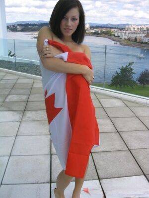 Teen amateur Kate wraps her naked body up in a Canadian flag on pornstar6.com