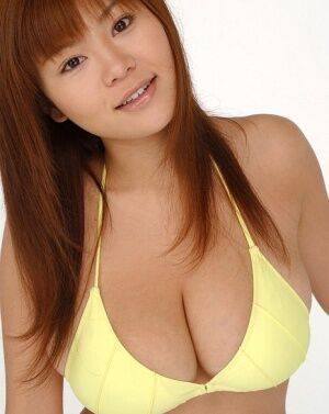 Pretty Japanese redhead Yoko Matsugane models a yellow bikini in bare feet - Japan on pornstar6.com