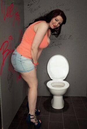 Big boobed female Vanessa Y gives head at bathroom gloryhole on pornstar6.com