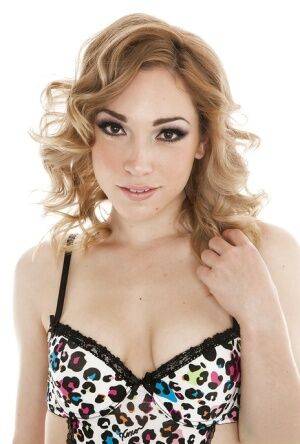 Amazingly lovely teen babe Lily Labeau stripping off her lingerie on pornstar6.com