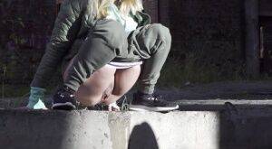 Caucasian girl Diana pisses on a sidewalk in a derelict environment on pornstar6.com