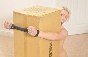 Tied Virgins Emma the slut is tied up to a box on pornstar6.com