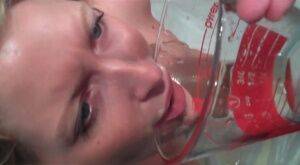 Young blonde slut get to drink her own piss on a glass on pornstar6.com