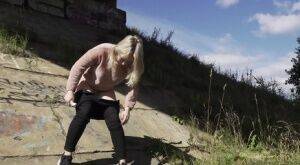 Blonde girl Nastya pulls down her pants for a badly needed pee in the outdoors on pornstar6.com