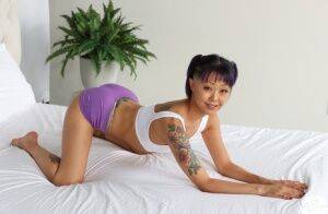 Tattooed Asian girl Saya Song has POV sex with a big white cock on pornstar6.com