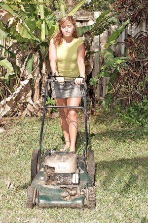 Curvy May Malani gets horny mowing the lawn so she gets naked. on pornstar6.com