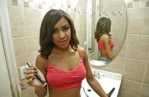 Amateur black babe Nicole flaunting big natural saggy tits in bathroom on pornstar6.com