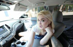 Blonde girl Anastasia Knight gives a blowjob inside a parked car on pornstar6.com