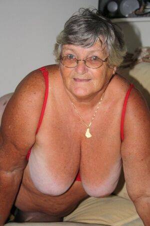 Morbidly obese nan Grandma Libby licks a nipple before spreading her cunt on pornstar6.com