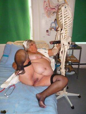 Fat old nurse Grandma Libby attaches a dildo to a skeleton for sexual relief on pornstar6.com