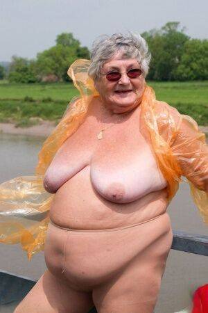 Obese British amateur Grandma Libby casts off a see-through raincoat - Britain on pornstar6.com