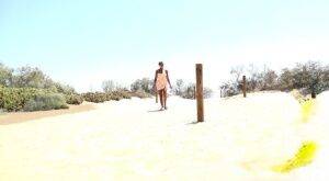 Solo girl Chloe Lamour takes a big piss while crossing a patch of sand on pornstar6.com