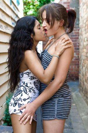 Indian lesbian Kiki tongue kissing white girlfriend Lou-Ellyn outdoors - India on pornstar6.com