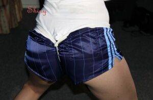 Sonja wearing a sexy oldschool blue shiny nylon shorts and a white top being on pornstar6.com