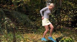 Cute blonde Victoria Pure hikes her skirt to take a pee along country lane on pornstar6.com