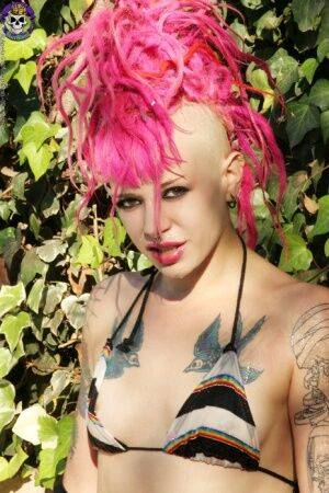 Pink haired tattooed punk girl by the pool on pornstar6.com