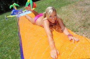 Young blonde Ally Kay ends a water fight by having sex in backyard on pornstar6.com