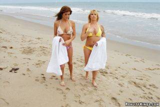 Brooke haven and lisa daniels take off their bikinis and enjoy strapon sex on pornstar6.com