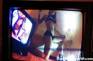 Dani daniels posing and watching herself on video on pornstar6.com