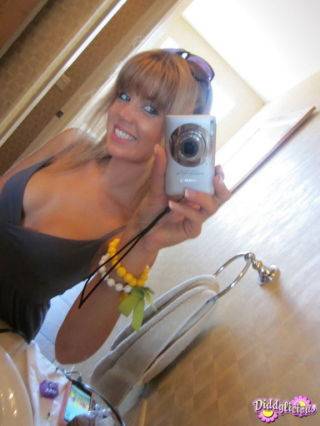 Cute amateur teen girl teasing in mirror on pornstar6.com