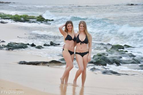 Curious girls Teddi Rae and Veronica Weston make soft lesbian action on the beach on pornstar6.com