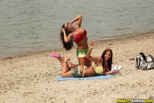 Hot girls Kyra Hot and Candi Coxx enjoy a lesbian foreplay at beach on pornstar6.com