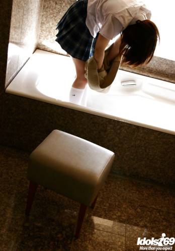 Stunning japanese teen Hina Tachibana exposes big tits and hot butt in the bathroom - Japan on pornstar6.com