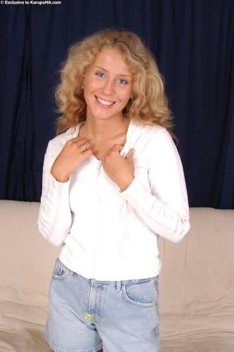 Sylphlike blond teen Lita in fancy shorts revealing her butt and vagina on pornstar6.com